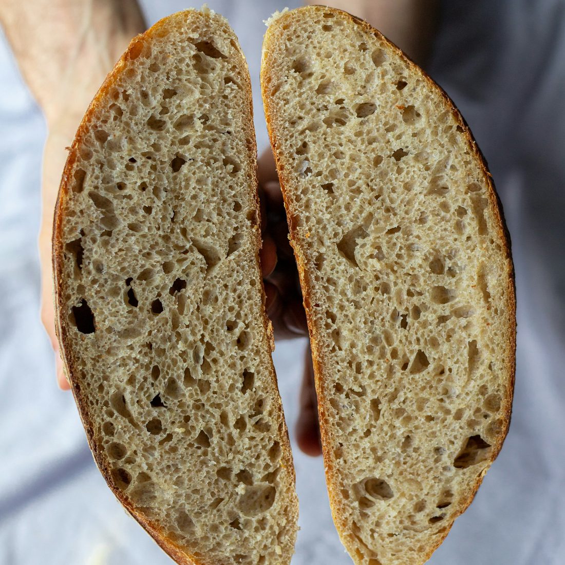 Cross-section of a handmade loaf showing an open, fluffy crumb